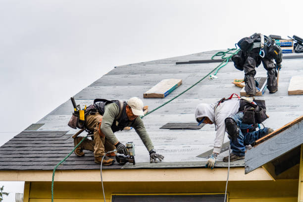 Professional Storm Damage Roof Repair technician working in Winthrop, MA